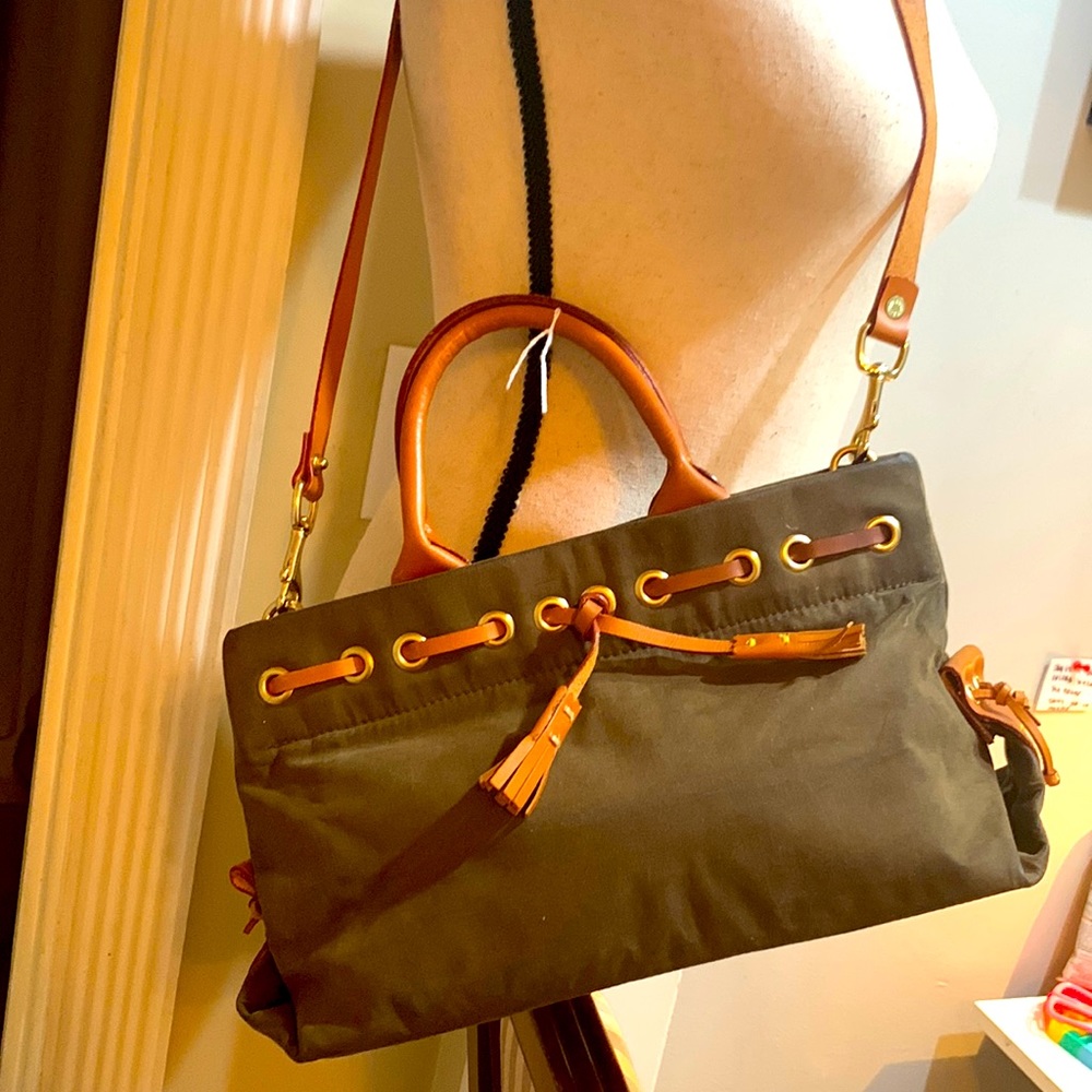 Dooney and Burke Fabric tote with tassels !!